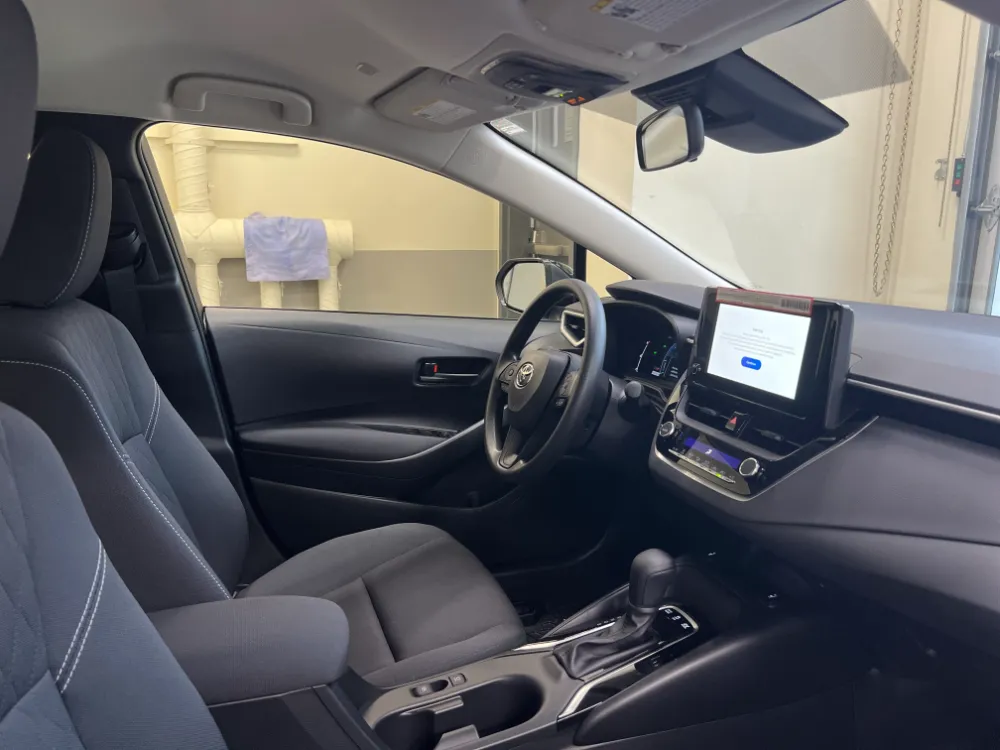 2023 toyota corolla hybrid le in black 8